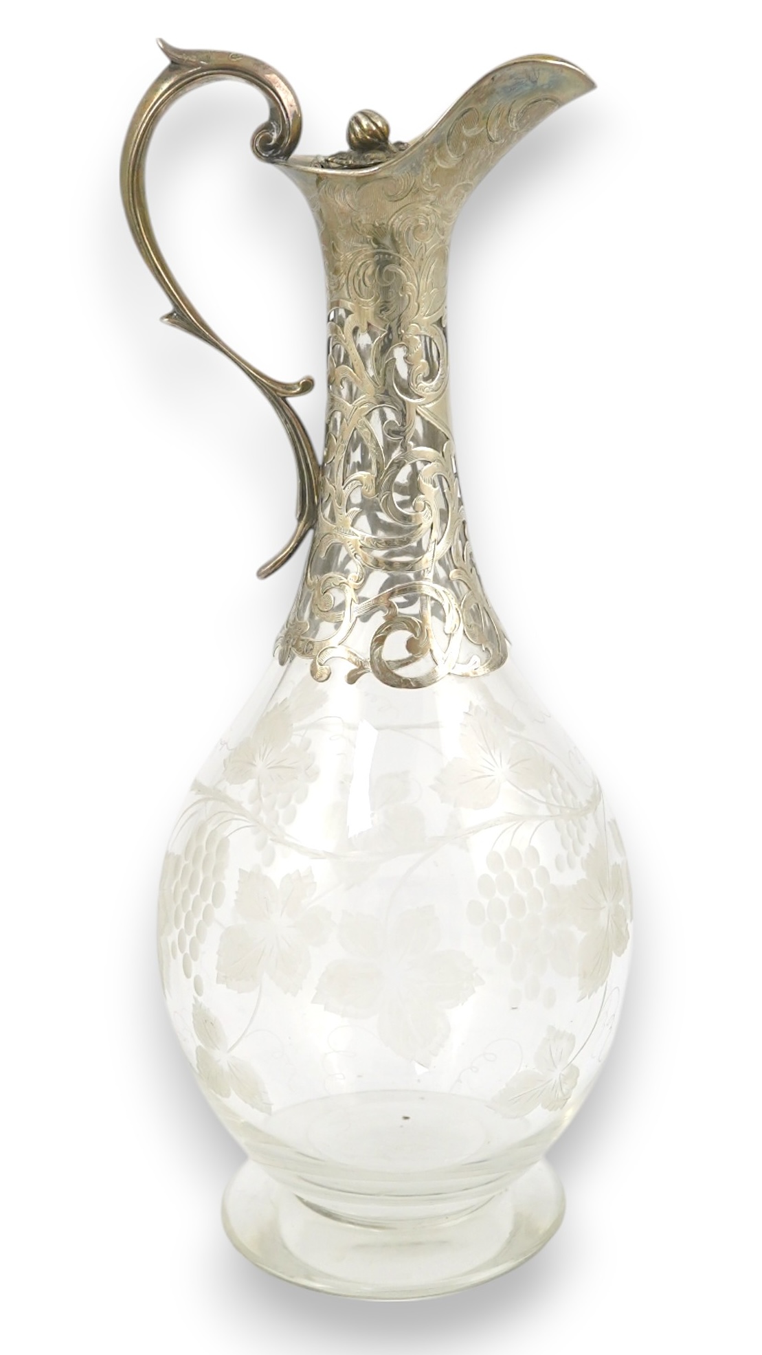 A Victorian parcel gilt silver mounted glass pyriform claret jug, by Joseph Angell II